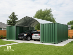 Dual vehicle carport made from green steel shipping containers with a curved metal roof, designed by Buildway for residential use. Provides durable and modern outdoor parking and storage space.