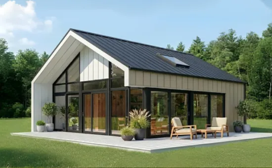 Modern home surrounded by greenery showcasing neutral metal building colors with black accents.